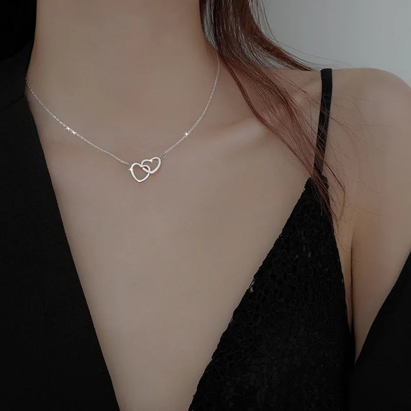 Delicate double heart necklace for women, crafted from high-quality 925 sterling silver with a gold-plated finish, perfect to wear for women and girls