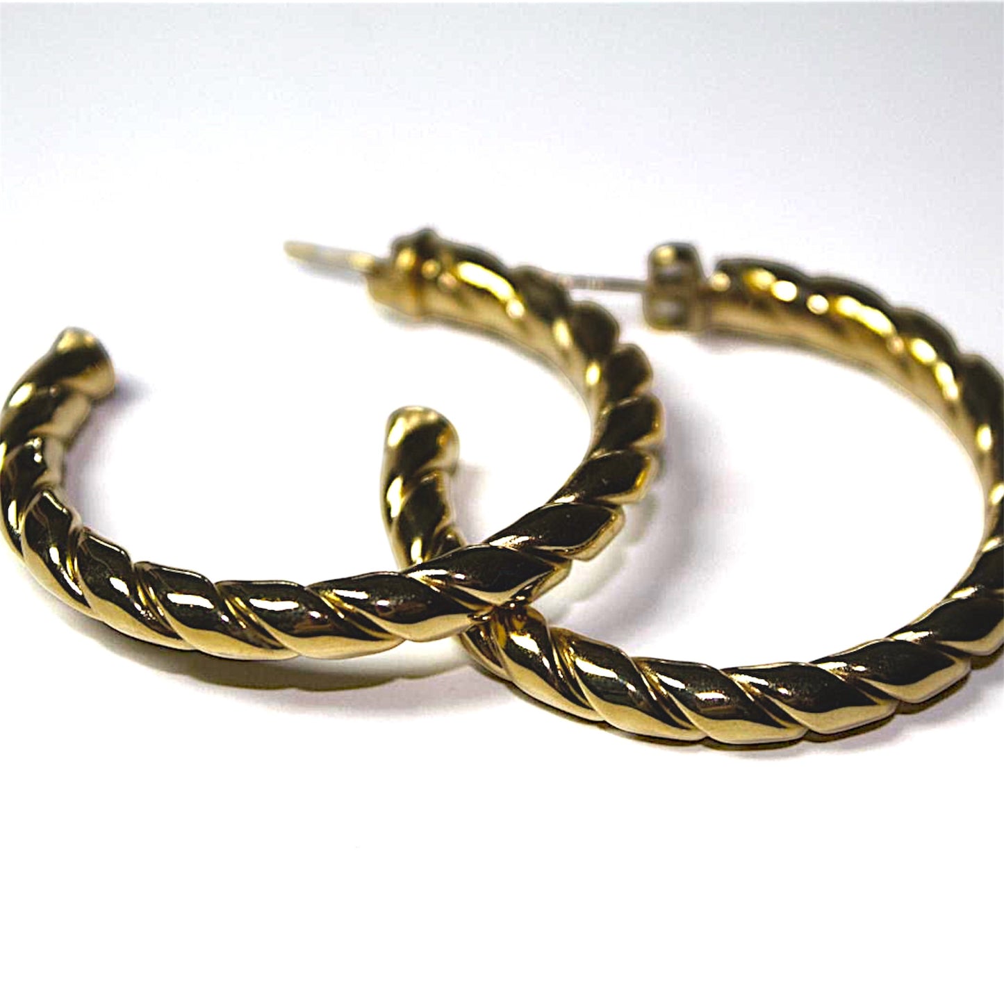 Stainless Steel twisted creoles gold-plated, waterproof and durable for everytime to wear. 