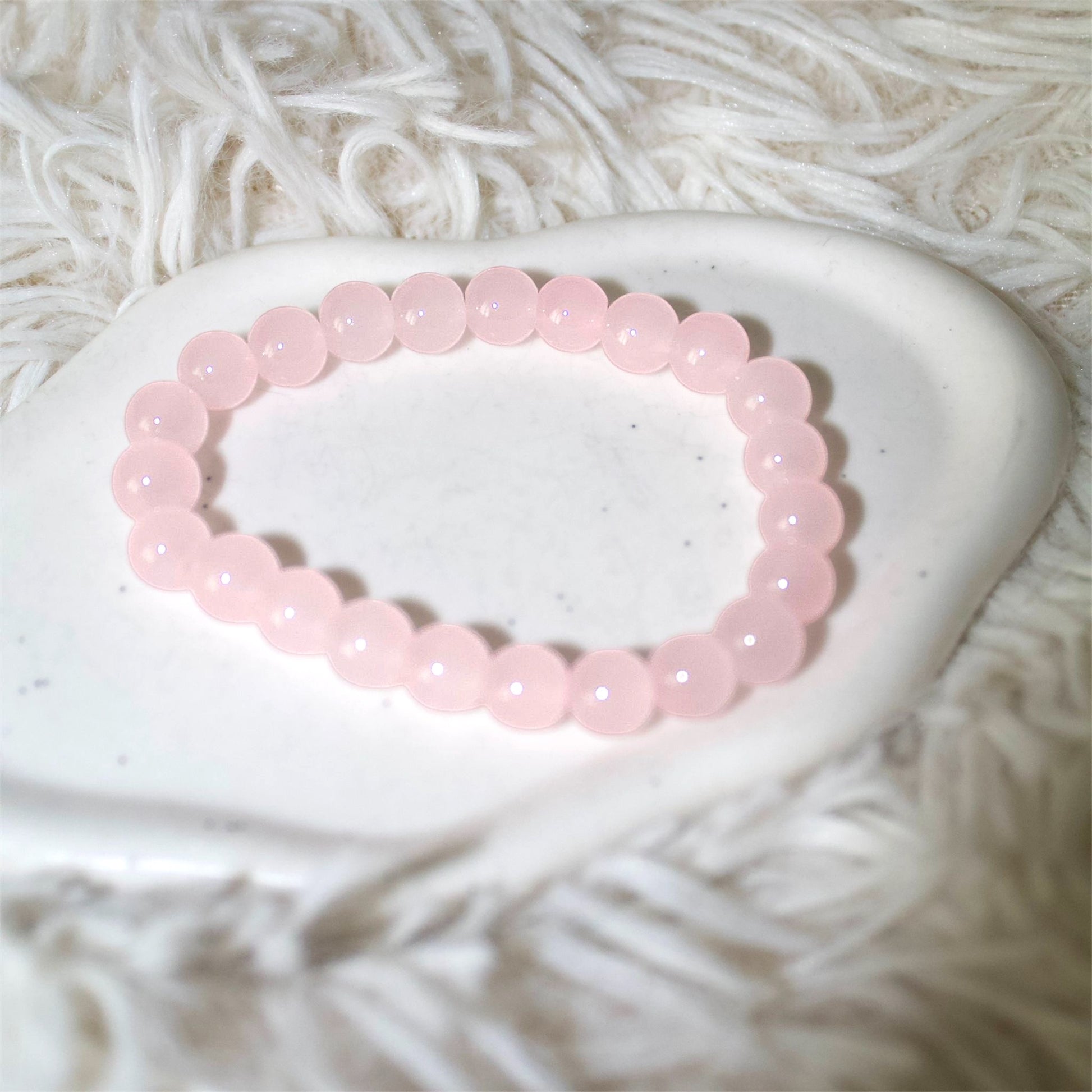 Pink gemstone bracelet, waterproof and durable. Stylish accessory for your holiday feeling.